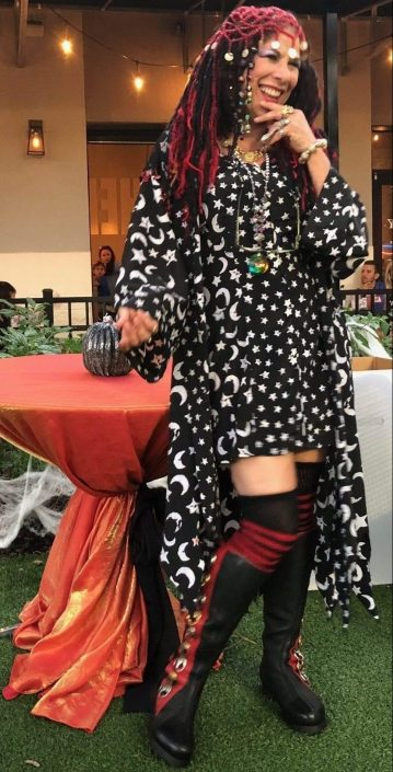 Natasha in her vibrant signature costume